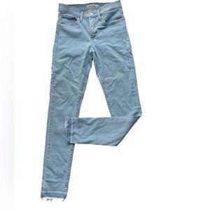Levi’s 311 Shaping Skinny Raw Hem Light Wash size 27